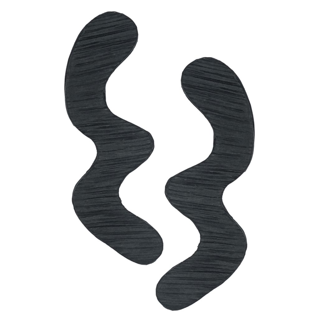 These handcrafted polymer clay studs by Héloïse Artisanal Jewelry feature a flowing wave design in classic jet black. These distinctive pieces blend artistic movement with professional sophistication, making them perfect for a refined statement style.