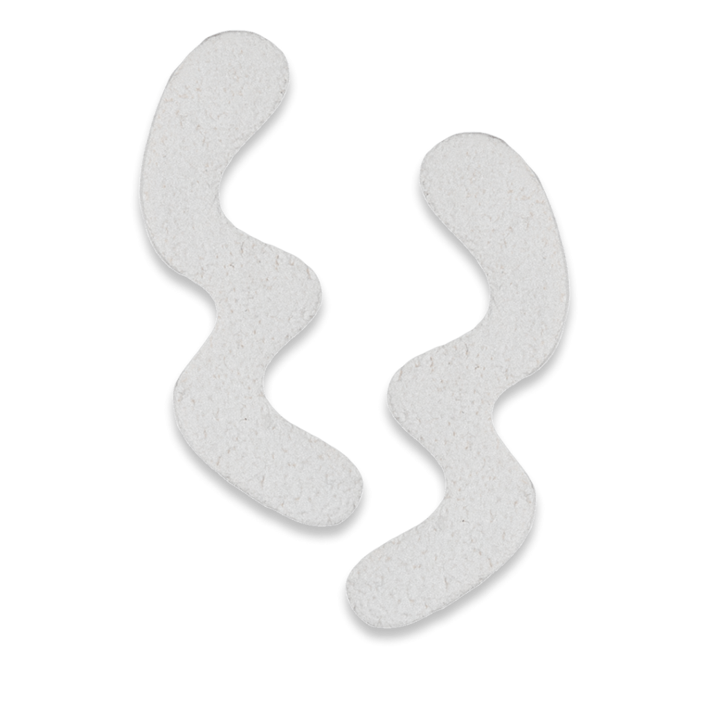 The Wave Stud Earrings in white polymer clay.